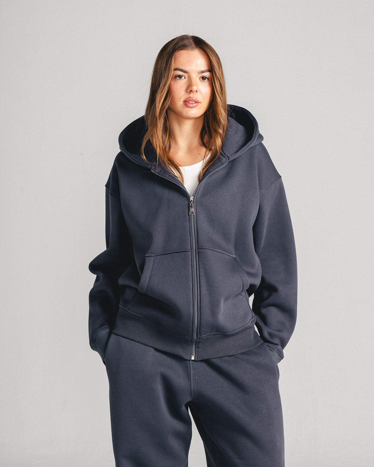 Charcoal Grey Core Fleece Zip up on female model