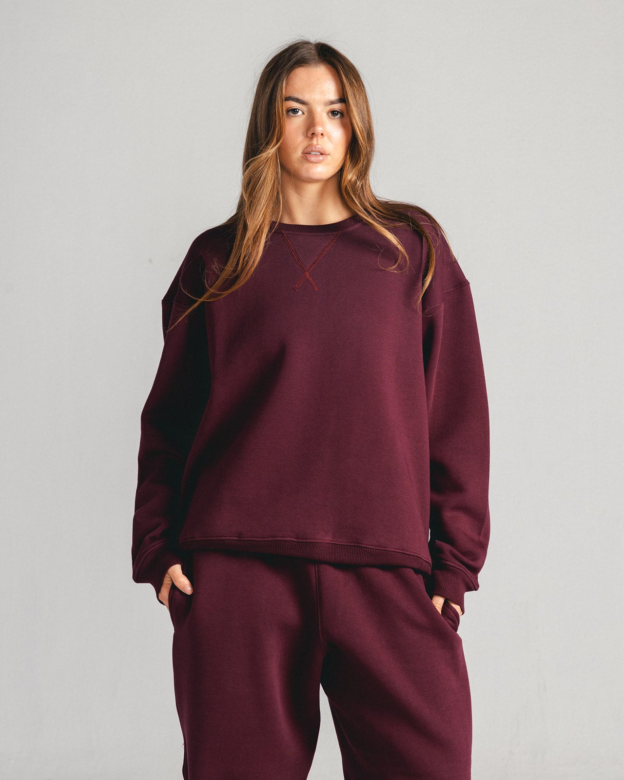 Burgundy Core Fleece Crewneck on female model