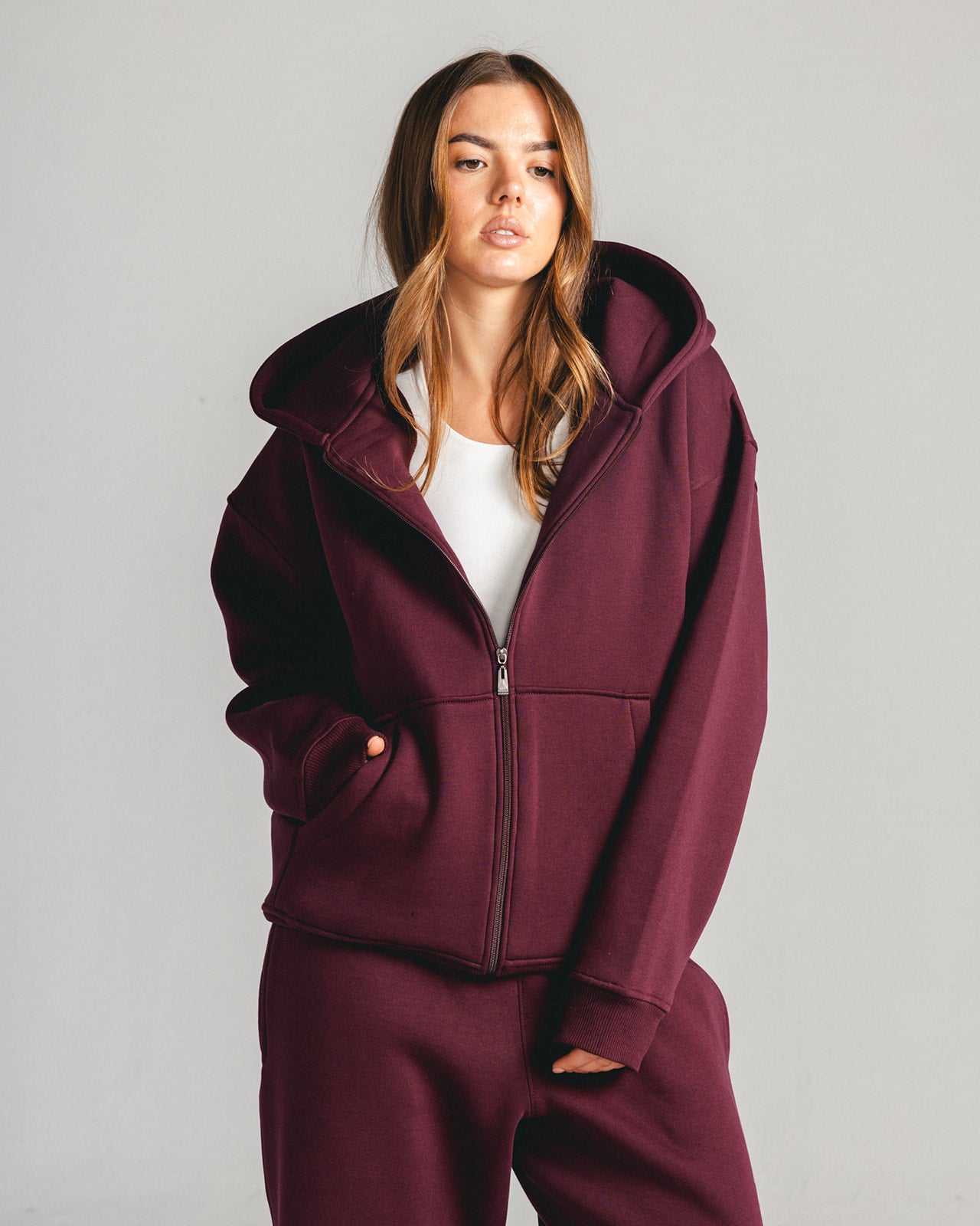 Burgundy Core Fleece Zip up on female model