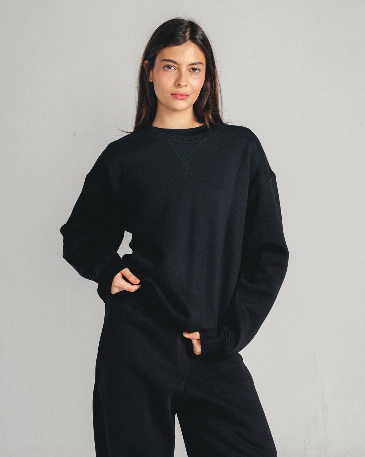Black Core Fleece Crewneck on female model