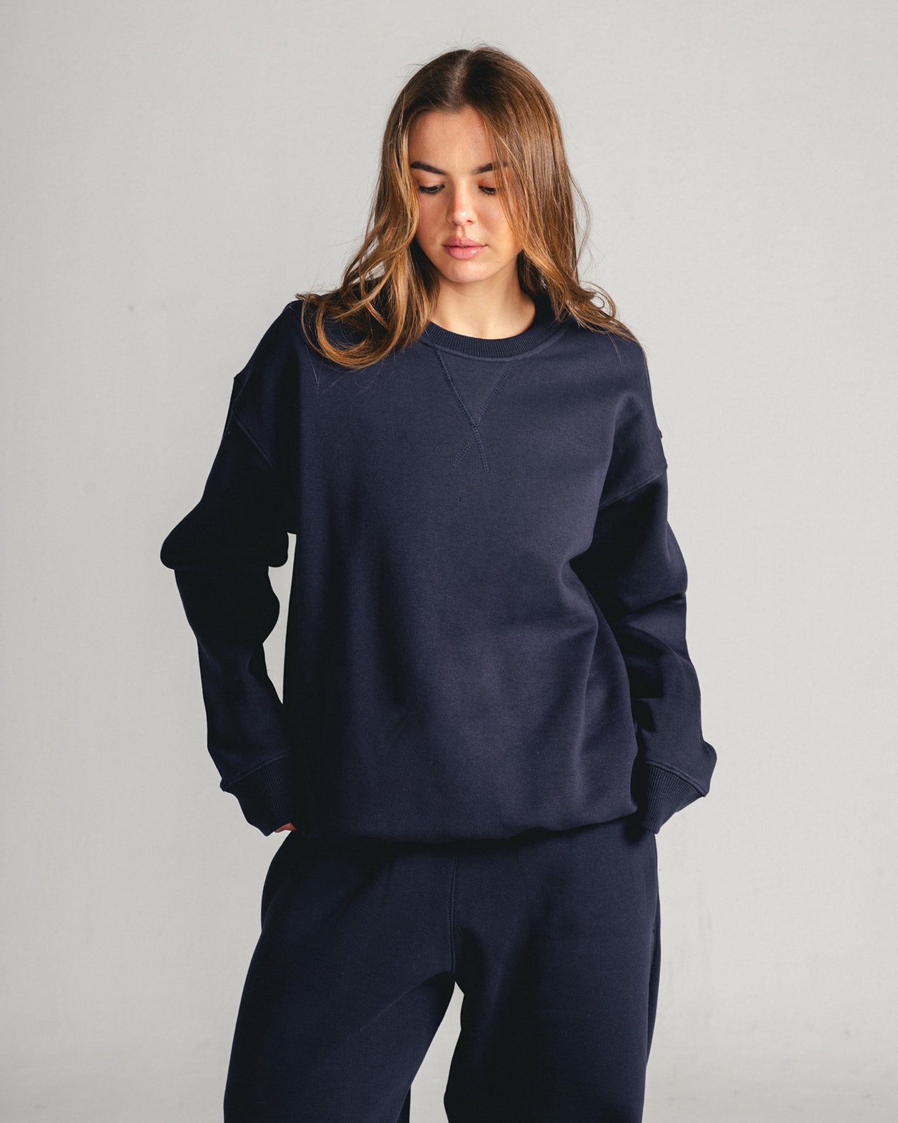 Navy Core Fleece Crewneck on female model