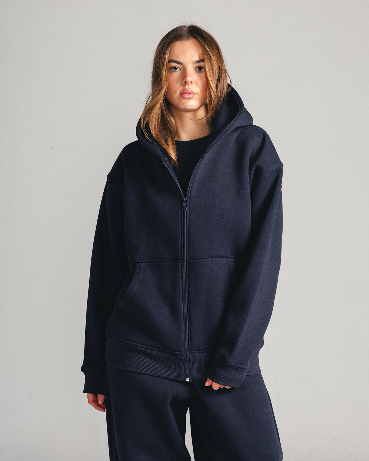 Navy Core Fleece Zip up on female model